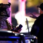 Стрельба на пляже в Сиднее: мужчина, который обезоружил нападавшего, получил ранения (фото)»>