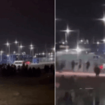 Авто охраны влетело в толпу: в порту Усть-Луга в РФ произошел бунт рабочих (видео)»>